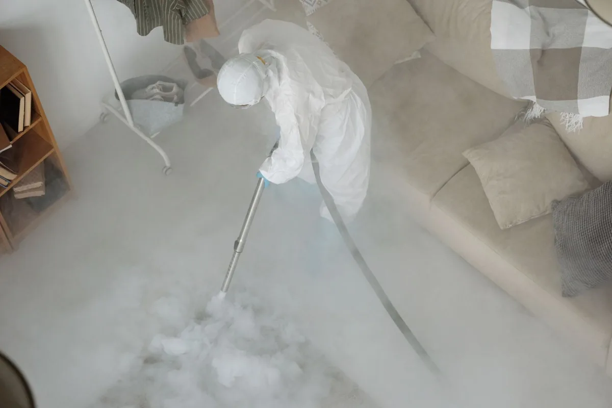 Biohazard cleanup technician in protective equipment, Fort Loramie, OH